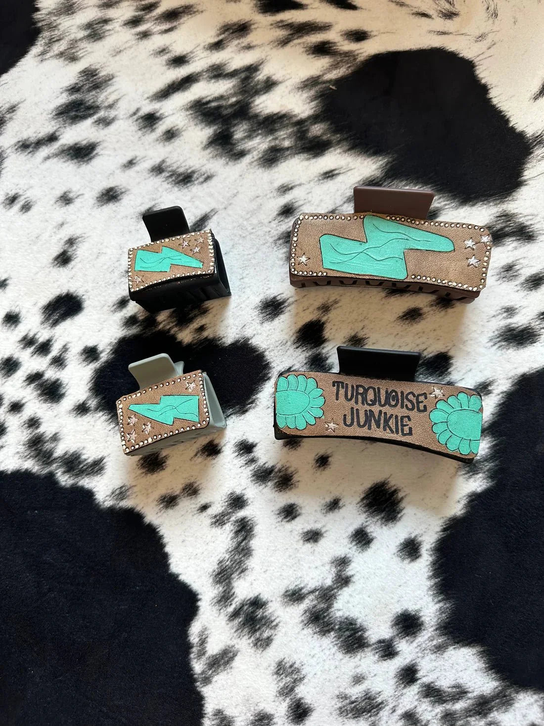 Tooled leather claw clips